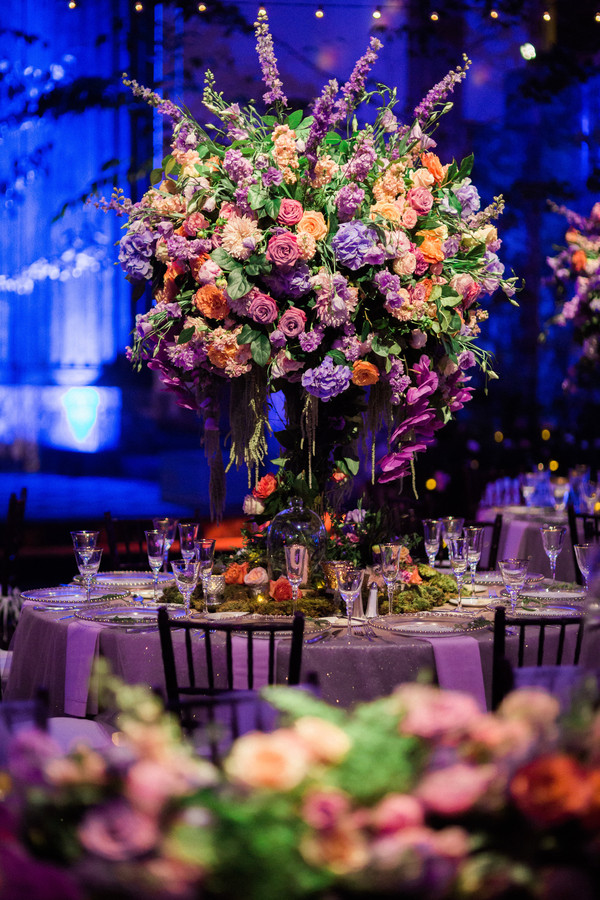 Purple and orange wedding centerpiece