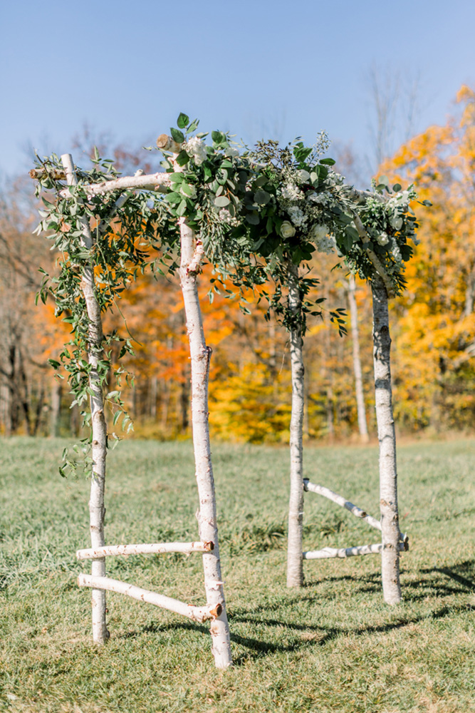 Rustic wedding ceremony arch