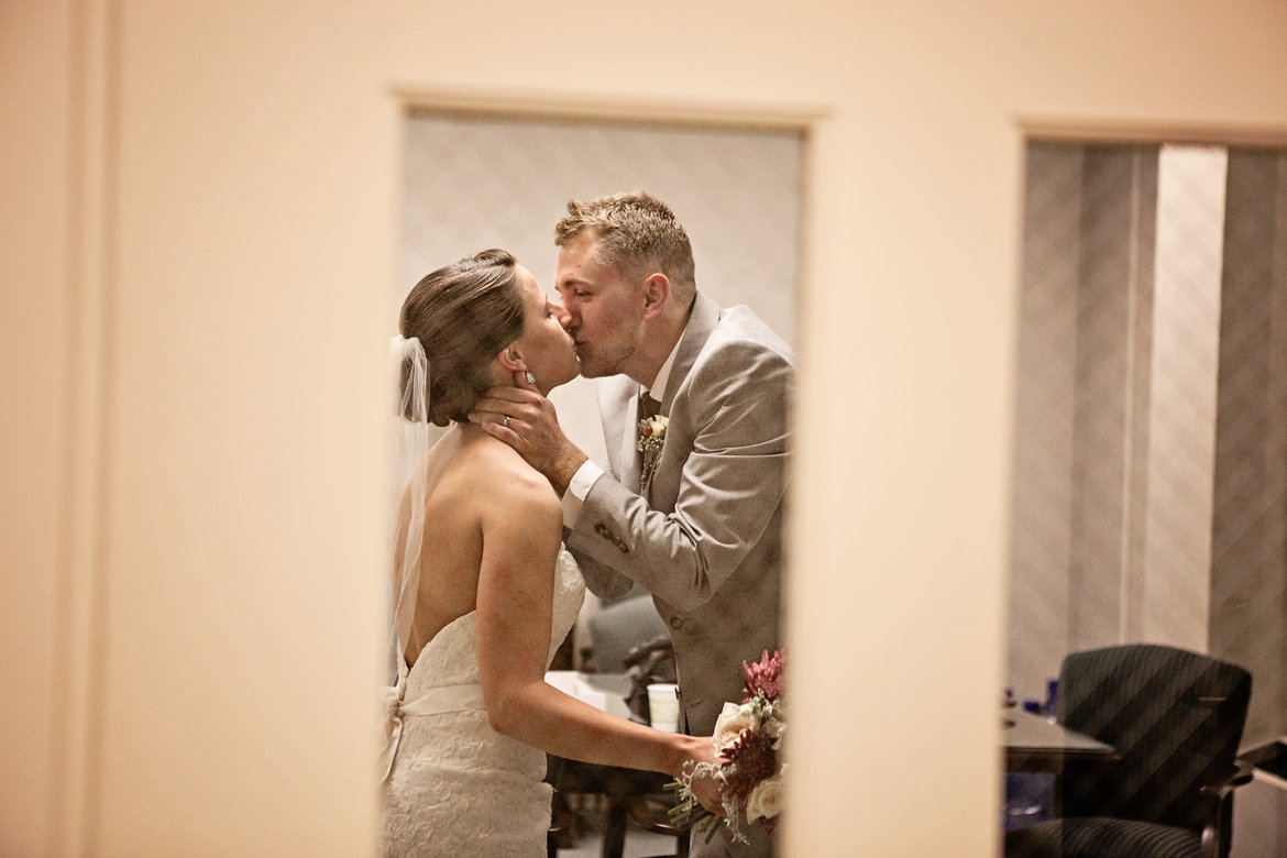 bride and groom celebrating post ceremony