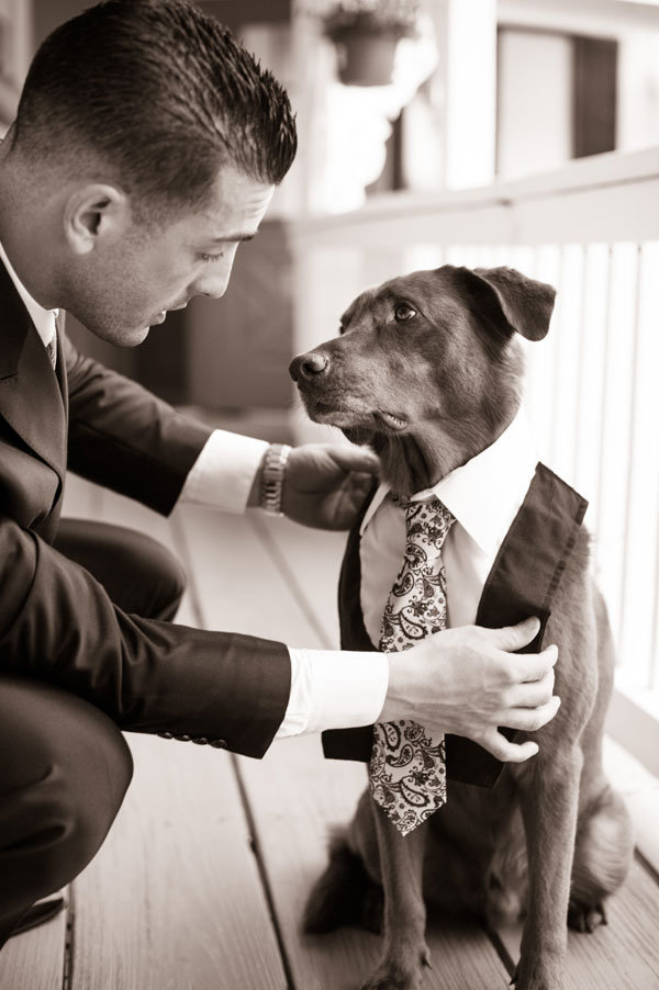 groom with dog 