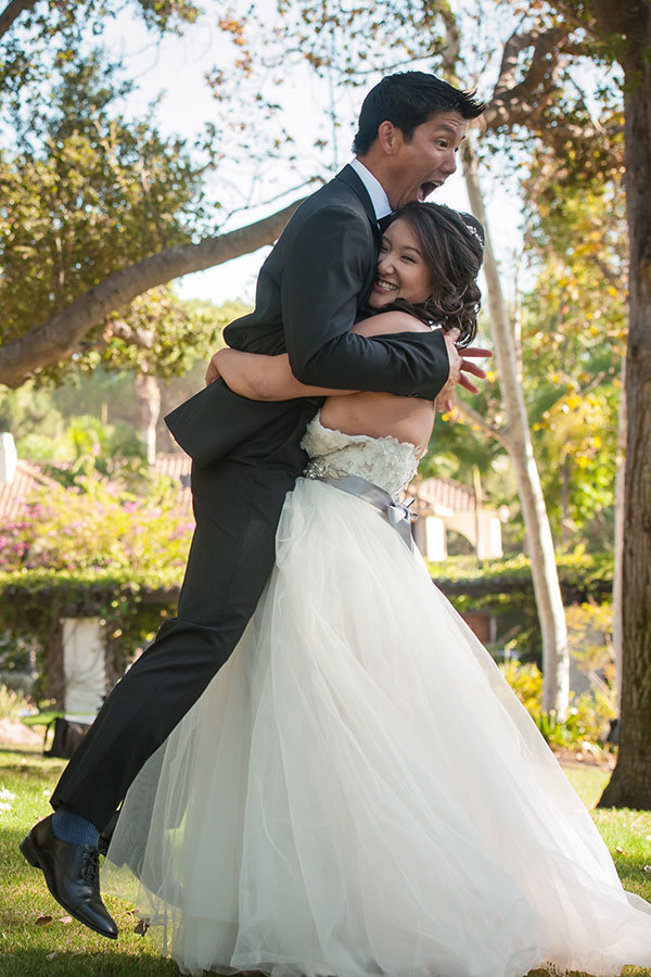 bride lifting groom