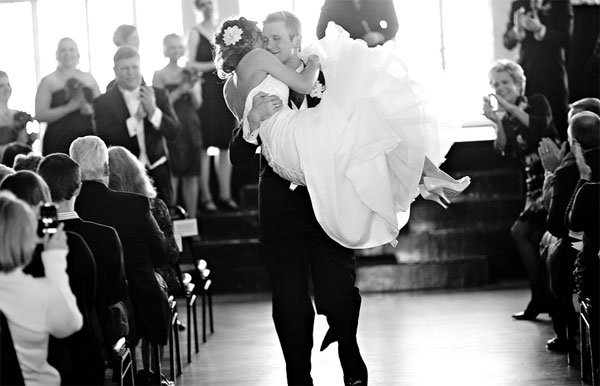 bride literally swept off her feet