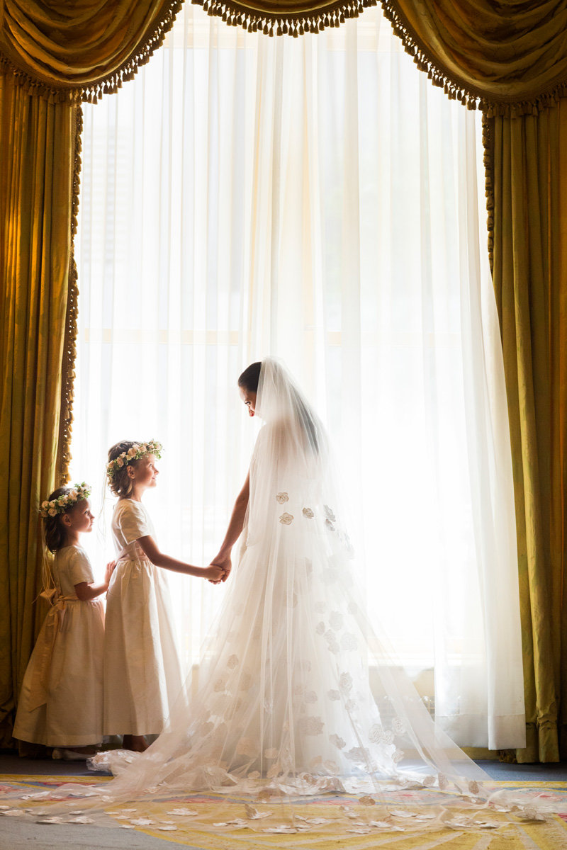 bride with flower girls