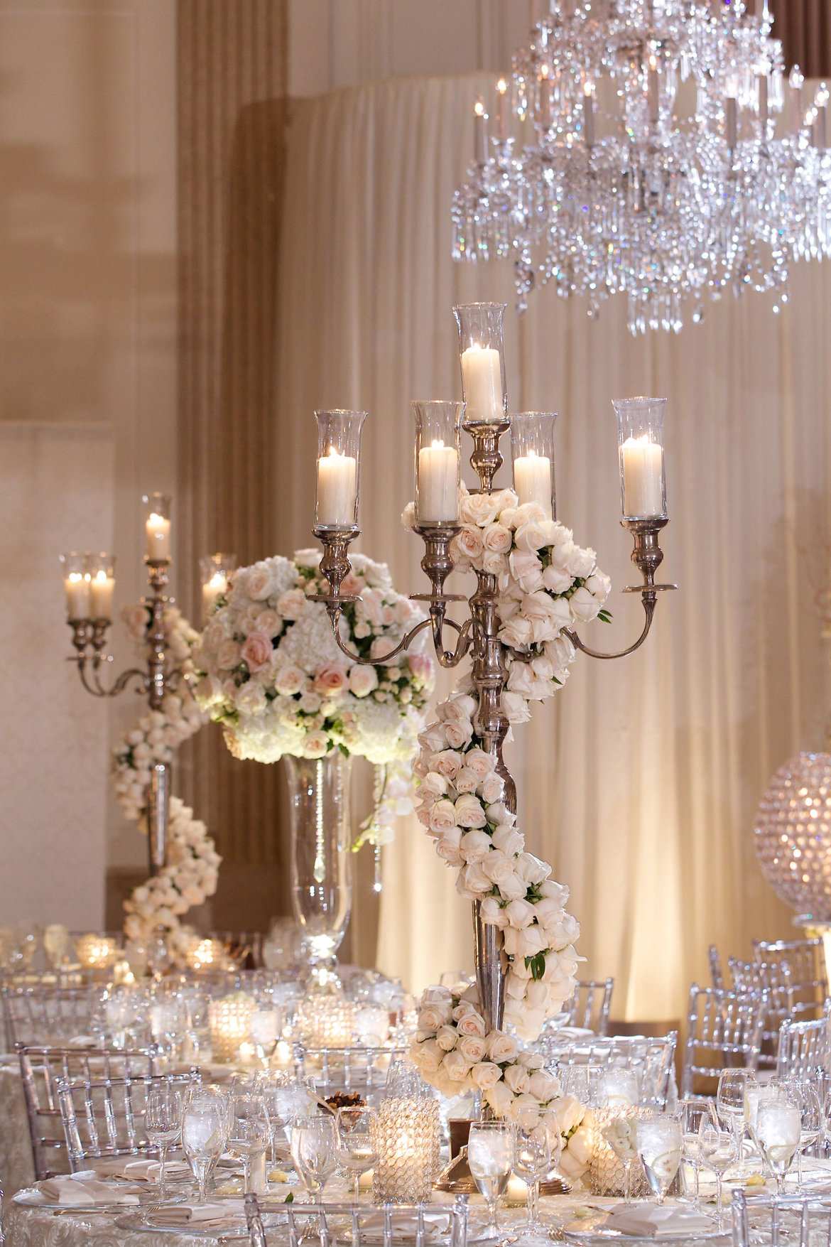 candelabra centerpiece with flowers