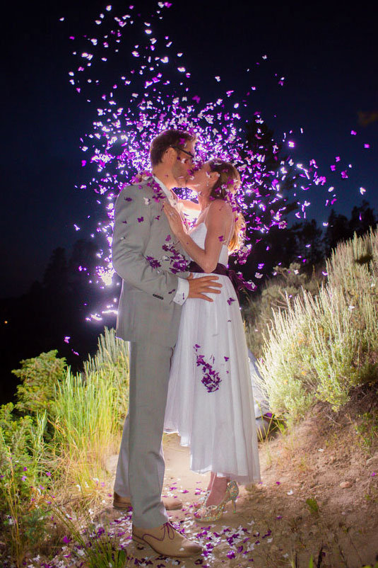 bride and groom covered in confetti