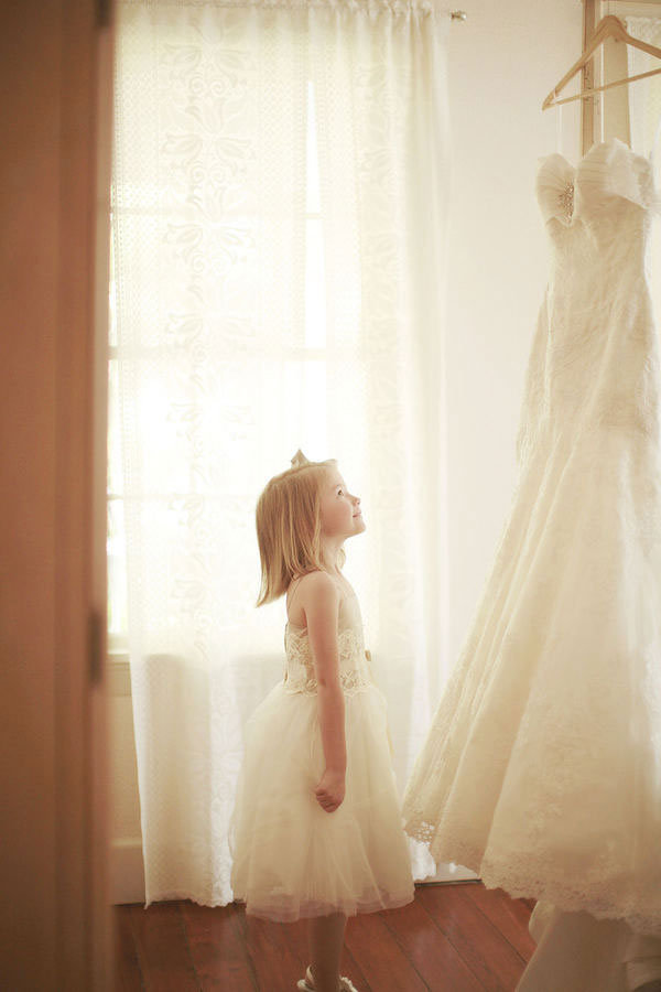 bride and groom through ring