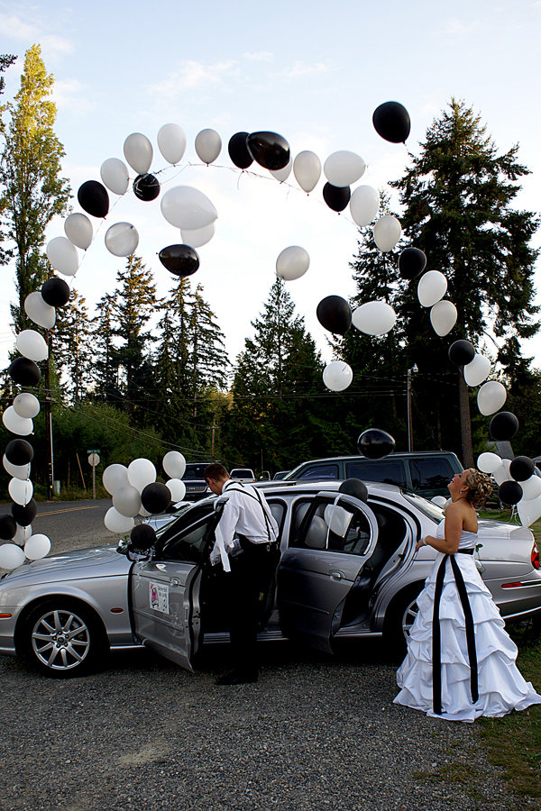 wedding getaway car with balloons