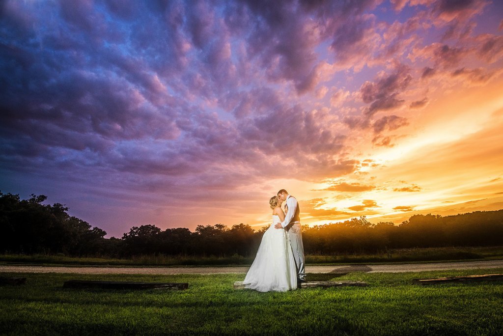 bride and groom at sunset