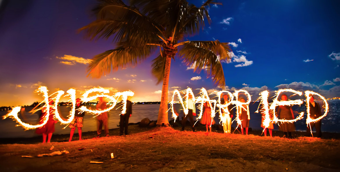 just married with sparklers