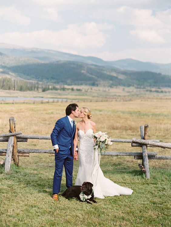 mountain wedding photo with adorable chocolate lab