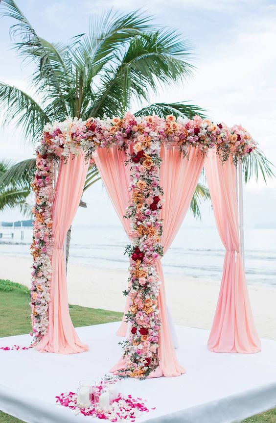 pink floral wedding arch