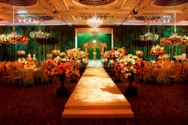 grass covered wedding backdrop