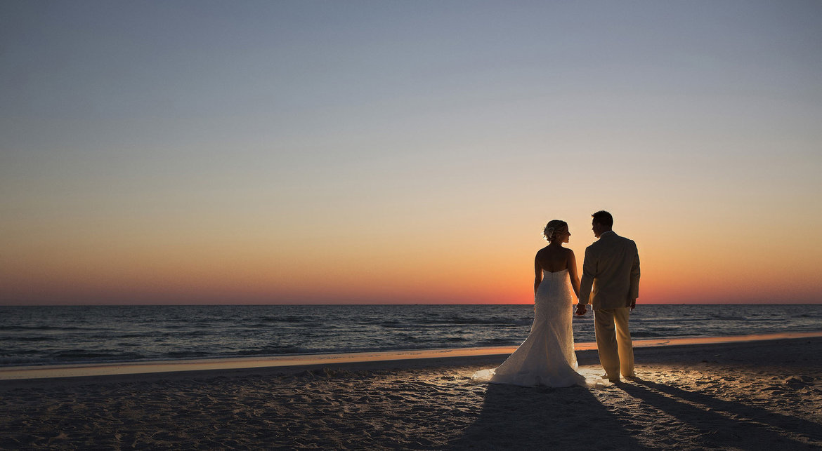 bride and groom at sundown