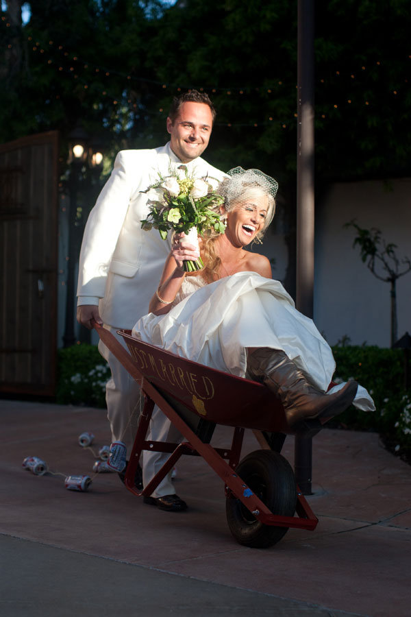 wheel barrow getaway car at wedding