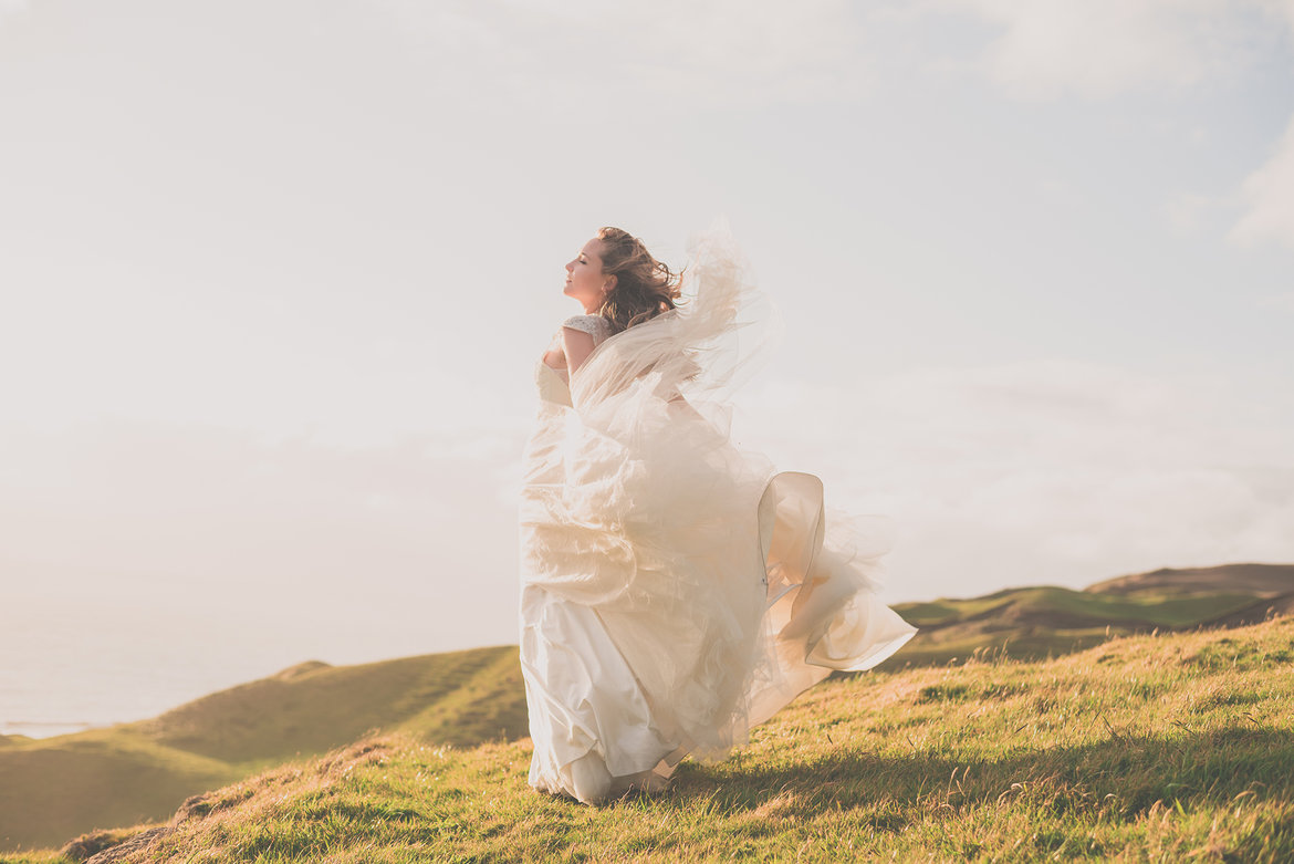 windy wedding day photo of the bride