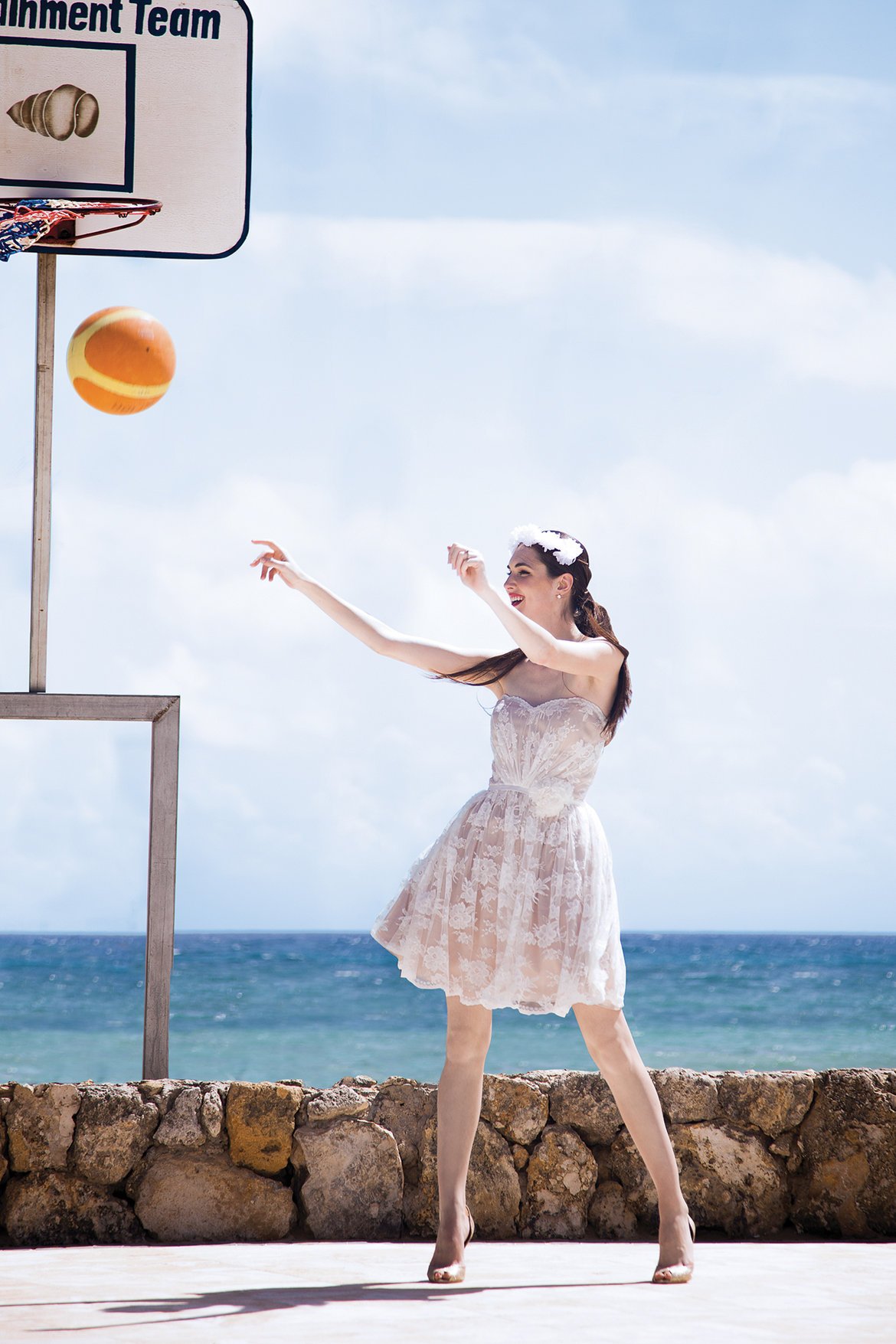 bride shooting basketball