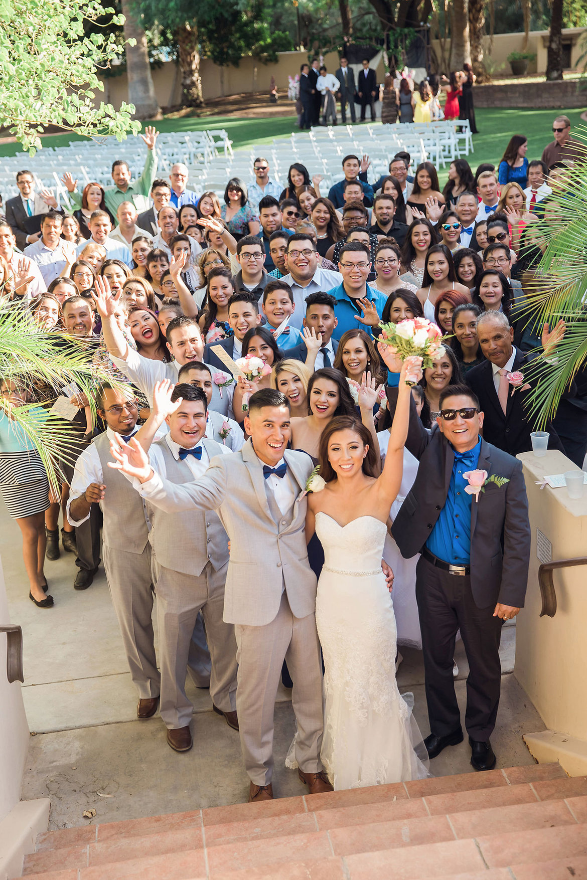 newlyweds with guests