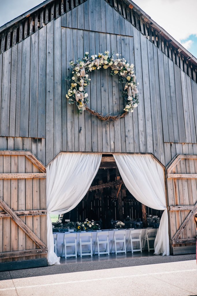 barn wedding entrance flower wreath