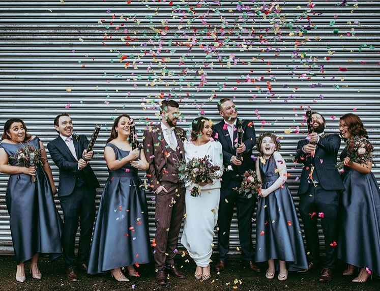 fall wedding photo dessy group navy bridesmaid dresses and confetti