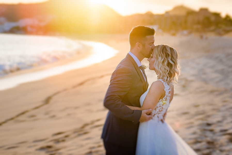 Bride and Groom Sunset Kiss on Beach