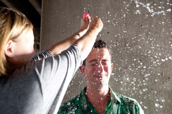 water balloons engagement photos