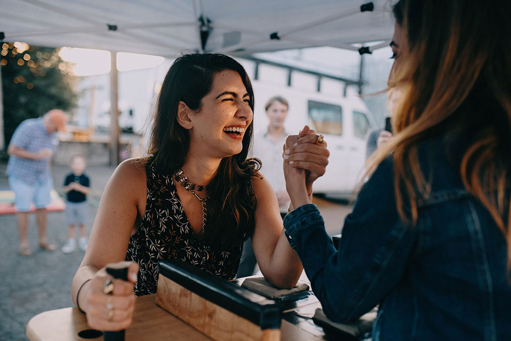 arm wrestling competition at wedding