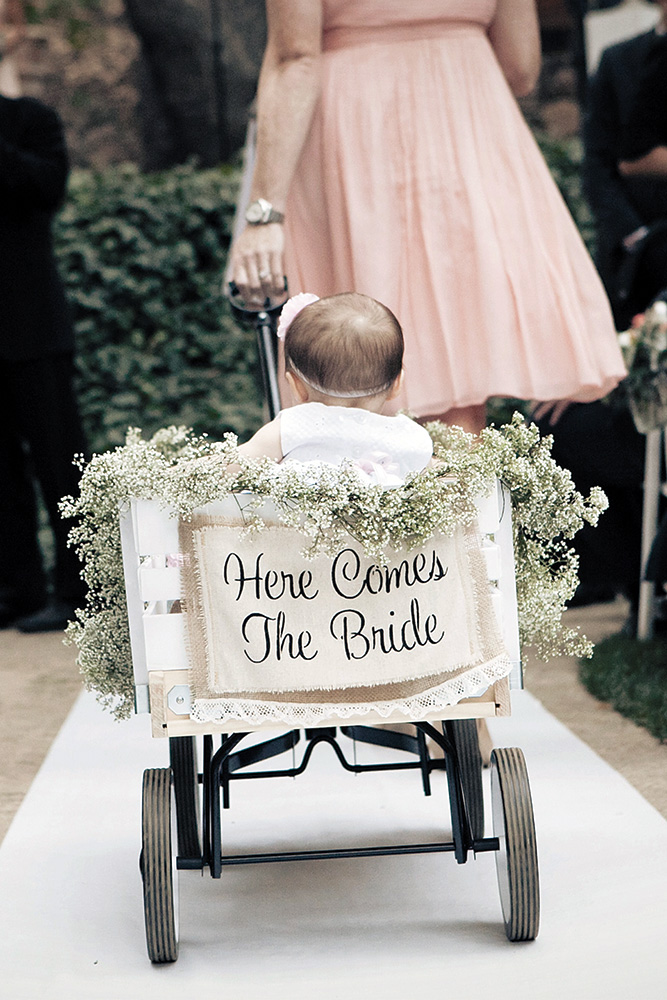 Flower girl in wagon