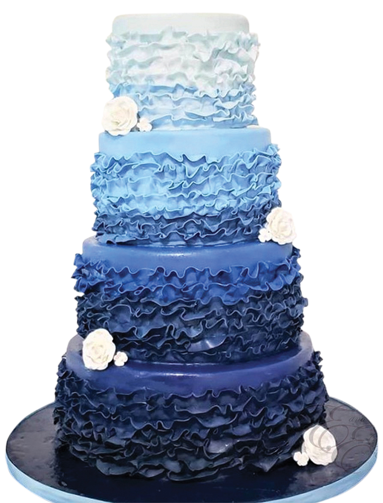 Blue ombre ruffled wedding cake