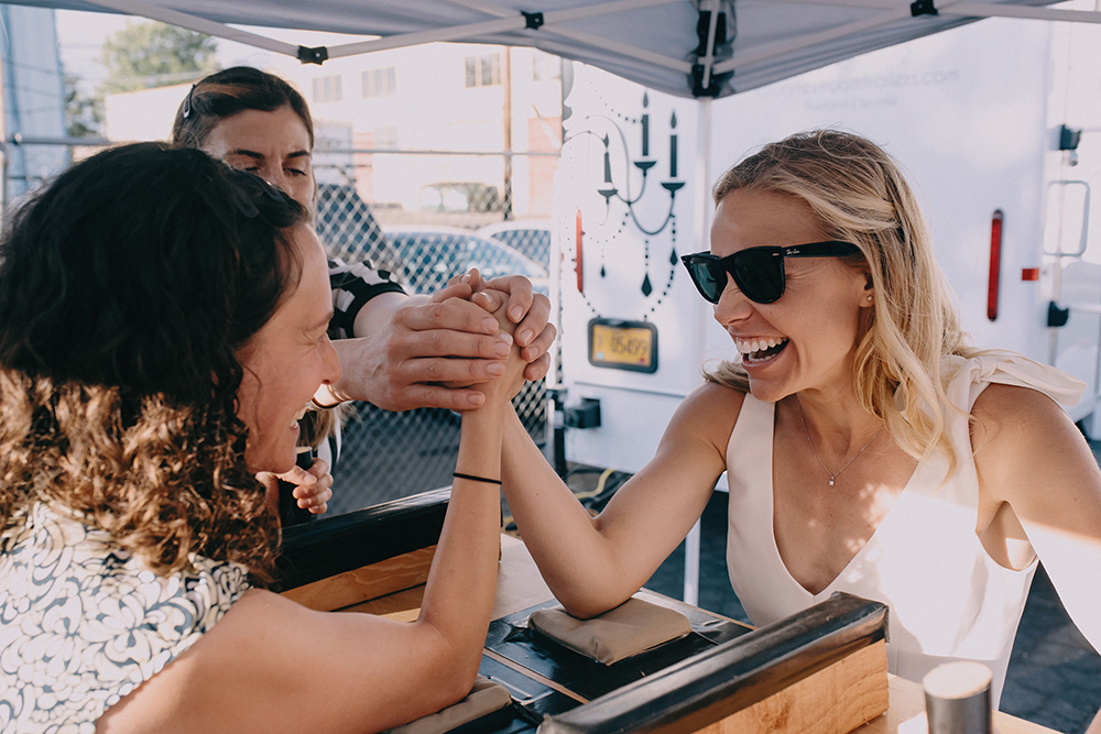 arm wrestling competition at wedding