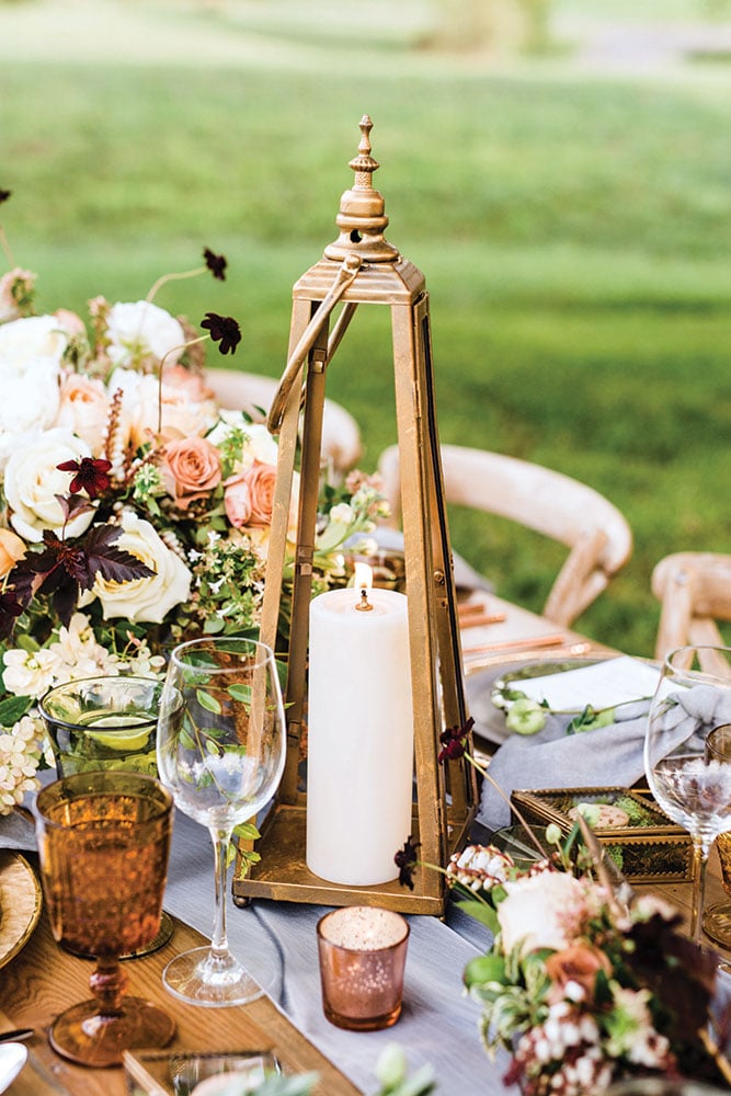 gold lantern wedding reception centerpiece