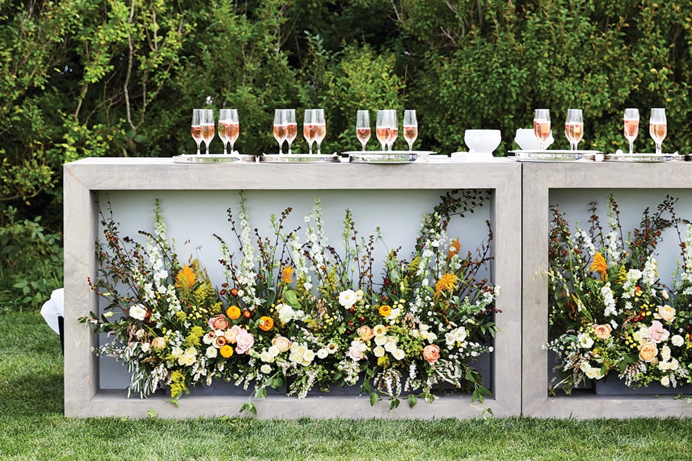 Flower bedecked bar at wedding