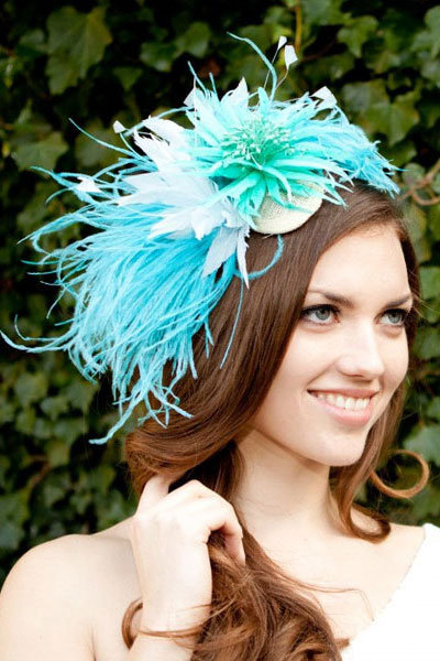 bride with feathered headpiece