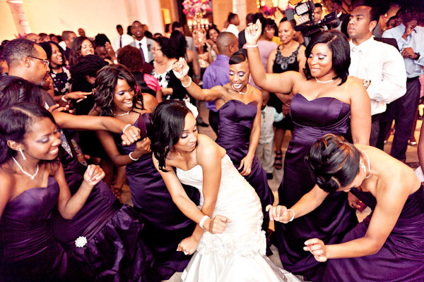 bride and bridesmaids dancing