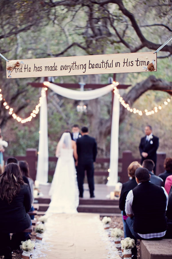 meaningful quote over the ceremony aisle