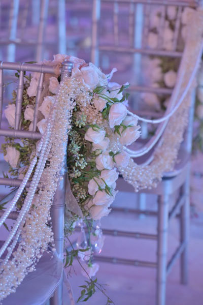 pearl stands ceremony aisle decor