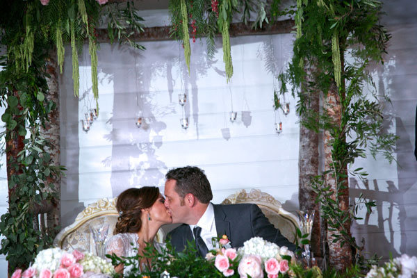 bride and groom kiss