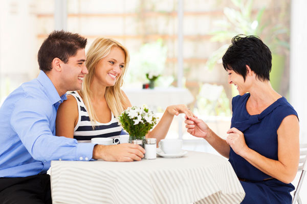 engaged couple with mother