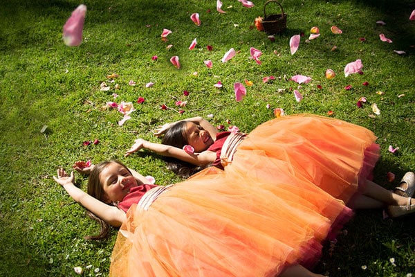 flower girls in the grass