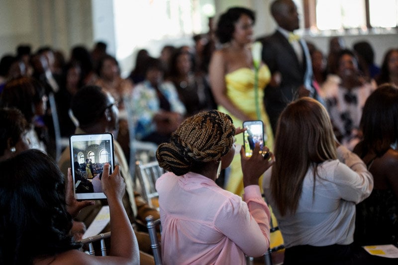 wedding guests taking photos