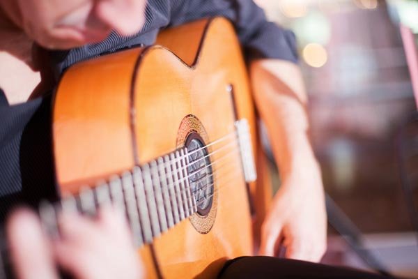 man playing guitar 