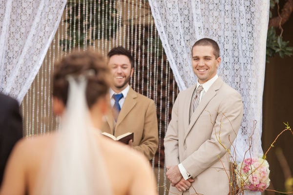 groom standing at altar