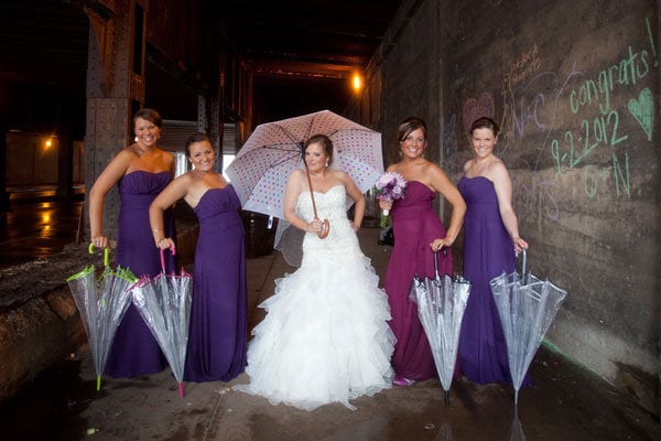 bridesmaids with umbrellas