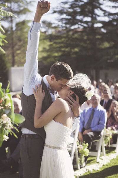 groom pumping fist into air